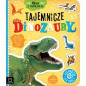 Książeczka edukacyjna Album z naklejkami. Tajemnicze dinozaury. Ciekawostki dla dziec Aksjomat